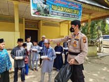 Polsek Langgam Laksanakan Kegiatan Jumat Barokah di Ponpes Tahfizul Quran