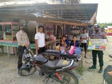 Tekan Penyebaran Covid-19, Polsek Bandar Sei Kijang Ajak Warga Patuhi Prokes