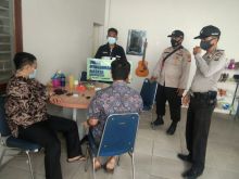 Covid-19 belum berakhir, Personil Polsek Kerumutan Terus Sosialisasikan Protokol kesehatan