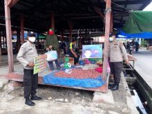 Cegah Covid-19, Polsek Kuala Kampar Imbau Masyarakat Patuhi Prokes