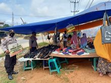 Polsek Ukui Ingatkan Masyarakat Selalu Terapakan Disiplin Protokol Kesehatan