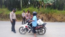 Stop Pengguna Jalan, Polsek Kerumutan Sosialisasikan Protokol Kesehatan