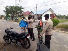 Polsek Kuala Kampar dan TNI Gelar Pendisiplinan Kepatuhan Protokol Kesehatan