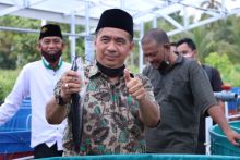 Ketua DPRD Inhil Buka Secara Resmi Panen Perdana Ikan Lele di Ponpes Syekh Abdurrahman Sidiq II (foto/rgo) 