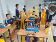 Pelatihan pembuatan baju APD di Lapas II a Bengkalis