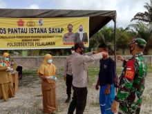 Polsubsektor Pelalawan Terus Galakan Yustisi di Pos PPKM