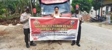 Personel Polsek Bandar Sei Kijang Sosialisasi Saber Pungli ke Sopir Truk