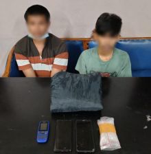 Dua tersangka dan barang bukti