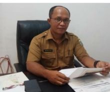 Guru Positif Covid-19, Satu Sekolah di Pelalawan Kembali Belajar Daring (foto/Ardi) 