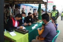 Terjaring Razia Protokol Kesehatan 6 Orang di Tembilahan Kerja Bhakti (foto/int) 