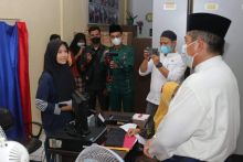 Mantap Kini Warga Tualang Tak Perlu Jauh-jauh Datang ke Disdukcapil Siak Guna Rekam e-KTP (foto/lin) 