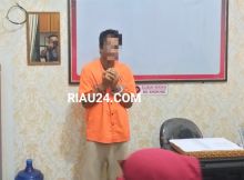 Tersangka IA alias Nuk saat di Mapolres Bengkalis