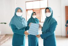 Pesan Rasidah Saat Pelatikan Ketua TP PKK  Tualang (foto/lin)
