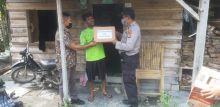 Polsek Singingi Berikan Sembako dan Edukasi Kepada Masyarakat, Sekaligus Laksanakan 3T (foto/zar)