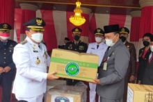 Bantuan Obat Dari Presiden Jokowi Tiba di Rohul, Bupati Sukiman Bagikan Untuk Warga yang Isolasi Mandiri (foto/int)