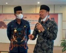 Bupati Afrizal Sintong