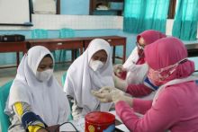 Saat suntik vaksin di MTSN 2 Tembilahan