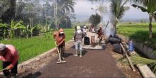 Pembangunan jalan di desa. Sumber: Dream.co.id