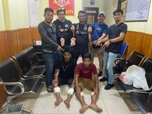 Dua tersangka saat diringkus Satreskrim Polres Bengkalis