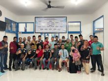 Pengurus PWI Bengkalis saat foto bersama Kadiskominfo Bengkalis