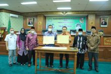 Berharap Masyarakat Kota Pekanbaru jadi Tuan Rumah di Rumah Sendiri, Pemko Tandatangani MoA dengan UIN Suska