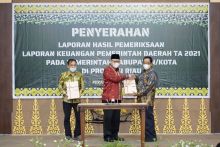 Penyerahan laporan hasil pwmeriksaan