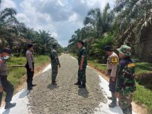 Penebaran base di Jalan Kelompok Tani Banjaran
