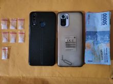 Barang bukti dari dua tersangka