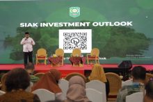 Bupati Siak, Alfedri saat peluncuran Outlook Investasi Yurisdiksi