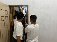 Pihak Satreskrim Polres Bengkalis saat identivikasi korban