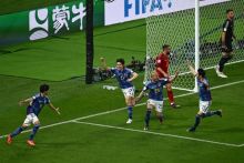 Potret Timnas Jepang Kontra Spanyol dengan Skor 2-1 yang Membawa Jepang Puncaki Klasemen Grup. (SPortstars/Foto)