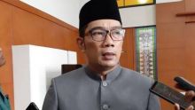 Ridwan Kamil berseragam Golkar. Sumber: Tribunnews.com