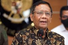 Potret Mahfud MD Menteri Politik, Hukum dan HAM. (VOI/Foto)