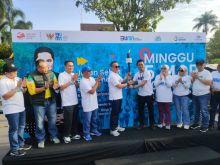 Caption : Sekitar 3.000 peserta ambil bagian dalam Jalan Sehat BUMN yang berlangsung meriah di Kota Pekanbaru, Provinsi Riau, Ahad (5/3/2023). Kegiatan yang dikoordinir PTPN V bersinergi dengan Jasindo, Indonesia Re serta sejumlah BUMN lainnya tersebut mendapat apresiasi tinggi dari Pemerintah Provi