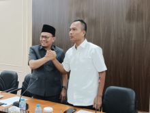 Syahrial ST MSi dan Khairul Umam
