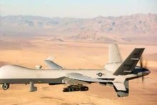 Foto selebaran milik Angkatan Udara AS yang diperoleh pada 7 November 2020 ini menunjukkan kendaraan udara tak berawak MQ-9 Reaper (UAV atau drone) terbang di atas Nevada Test and Training Range pada 14 Januari 2020 /AFP