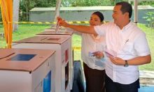 COO RAPP, Eduward Ginting bersama istri Diana Sinulingga bersama-sama menyalurkan hak suara pada Pemilu 2024, Rabu (14/2/2024)