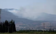 Foto dari 14 Juni 2024 ini menunjukkan permusuhan lintas batas yang sedang berlangsung antara Hizbullah dan pasukan Israel, di Kiryat Shmona /Reuters