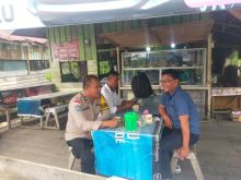 Anggota Polsek Bengkalis Sampaikan Pesan Pilkada Damai