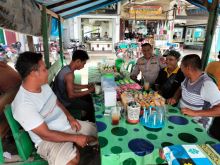 Gelar Cooling System, Panit Binmas Polsek Tualang Laksanakan Sosialisasi Pilkada Serentak 2024