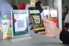 Ilustrasi penggunaan QRIS. Sumber: infobank