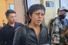 Adian Heran Kemenhub Kerap Ubah Peraturan Terkait Potongan Tarif Ojek Online.