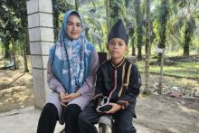 Kenali Dika Bocah Penari Pacu Jalur Kaunsing yang Viral Lewat 'Aura Farming'.