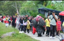 Semarak Jalan Sehat di Kwalian, Warga Meriahkan HUT RI ke-80 Penuh Kebersamaan