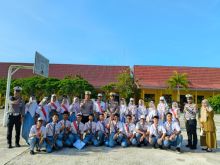 HUT Lalu Lintas Bhayangkara ke-70, Polsek Tualang Gelar Sosialisasi di SMAN 2 Tualang