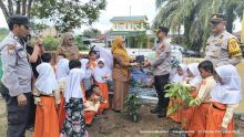 Polsek Kandis Tanamkan Cinta Lingkungan Sejak Dini Lewat Program Green Policing di TK Tunas Harapan Belutu