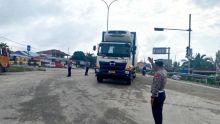 Hari ke-9 Operasi Lilin 2025, Polres Siak Intensifkan Pengaturan Lalu Lintas di Exit Tol Minas