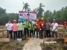 Danposal Bengkalis Hadir Pada Peletakan Batu Pertama Kampung Nelayan Merah Putih